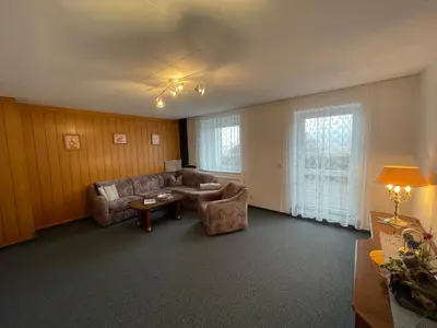 Ein Sitzbereich in der Unterkunft Ferienhaus Freitag - Ferienwohnungen mit Sauna & Frühstück