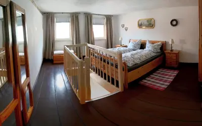 Ein Bett oder Betten in einem Zimmer der Unterkunft Ferienwohnungen zur Post - 102