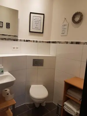 Ein Badezimmer in der Unterkunft Ferienwohnungen zur Post - 102