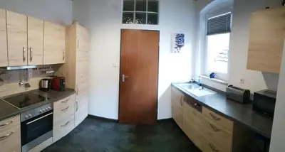 Küche/Küchenzeile in der Unterkunft Ferienwohnungen zur Post - 102