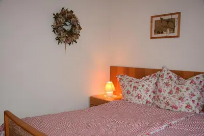 Ein Bett oder Betten in einem Zimmer der Unterkunft Ferienhof Schricker