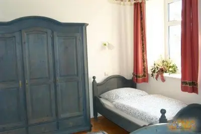 Ein Bett oder Betten in einem Zimmer der Unterkunft Ferienhof Schricker