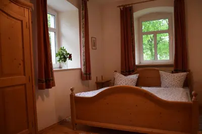 Ein Bett oder Betten in einem Zimmer der Unterkunft Ferienhof Schricker