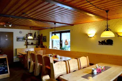 Ein Sitzbereich in der Unterkunft Landgasthof und Pension Erzgebirgsstübel
