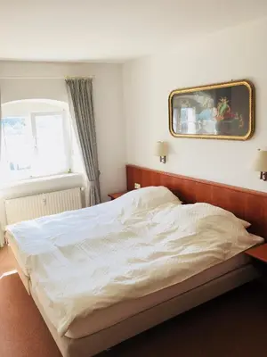 Ein Bett oder Betten in einem Zimmer der Unterkunft Ferienwohnung König Max