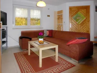 Ein Sitzbereich in der Unterkunft Ferienhaus Uda