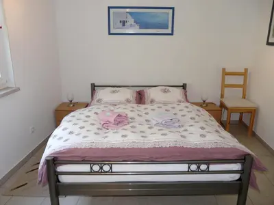 Ein Bett oder Betten in einem Zimmer der Unterkunft Ferienhaus Uda