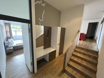 Ein Bett oder Betten in einem Zimmer der Unterkunft Reit- und Sporthotel Eibenstock