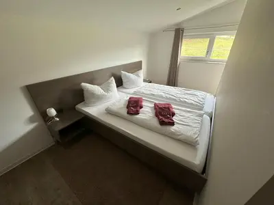 Ein Bett oder Betten in einem Zimmer der Unterkunft Reit- und Sporthotel Eibenstock