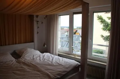 Ein Bett oder Betten in einem Zimmer der Unterkunft Apartment Rheingold