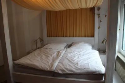 Ein Bett oder Betten in einem Zimmer der Unterkunft Apartment Rheingold