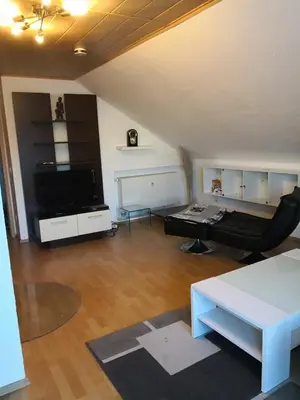 Ein Sitzbereich in der Unterkunft Ferienwohnung Schmeisser
