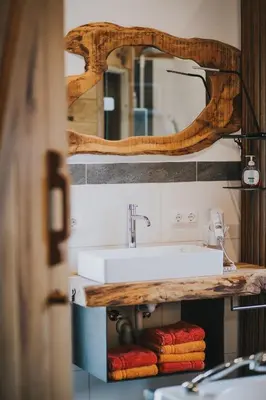 Ein Badezimmer in der Unterkunft Luxus-Chalet am Fluss