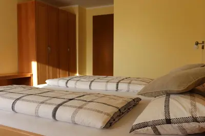 Ein Bett oder Betten in einem Zimmer der Unterkunft Hotel Zum Waldstein