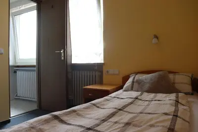 Ein Bett oder Betten in einem Zimmer der Unterkunft Hotel Zum Waldstein