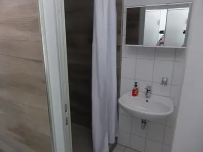 Ein Badezimmer in der Unterkunft Pension und Gaststätte Naturbaude Eschenhof
