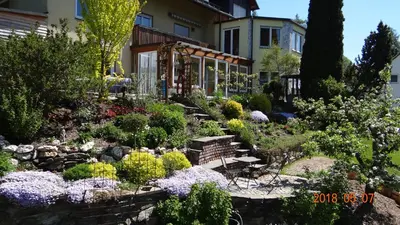 Ein Garten an der Unterkunft Ferienwohnung Weitermann