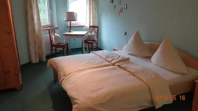 Ein Bett oder Betten in einem Zimmer der Unterkunft Ferienwohnung Weitermann