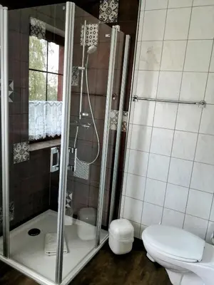 Ein Badezimmer in der Unterkunft Pumphuts Scheune Ferienwohnungen Nr 1 - 4 beim Freizeitpark Plohn