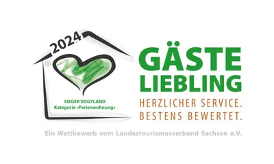 Ein Zertifikat, Auszeichnung, Logo oder anderes Dokument, das in der Unterkunft Pumphuts Scheune Ferienwohnungen Nr 1 - 4 beim Freizeitpark Plohn ausgestellt ist