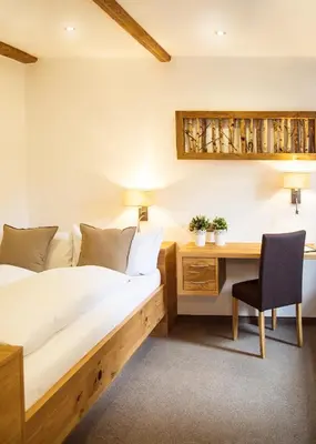 Ein Bett oder Betten in einem Zimmer der Unterkunft Pension Sommer