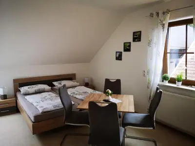 Ein Bett oder Betten in einem Zimmer der Unterkunft Angeln am Regen - Angelhof Posl