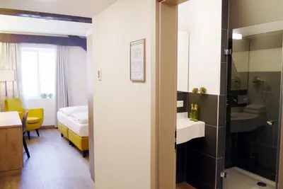 Ein Bett oder Betten in einem Zimmer der Unterkunft Das Brunners