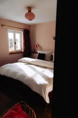 Ein Bett oder Betten in einem Zimmer der Unterkunft Bräustüberl Schönbrunn - Hotel & Restaurant