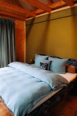 Ein Bett oder Betten in einem Zimmer der Unterkunft Bräustüberl Schönbrunn - Hotel & Restaurant