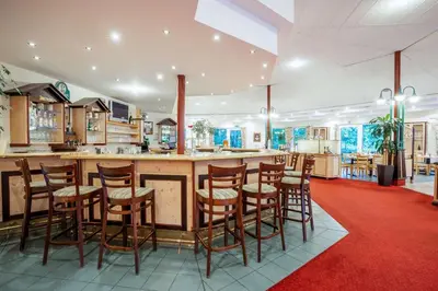 Ein Restaurant oder anderes Speiselokal in der Unterkunft Quality Hotel Hof