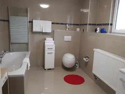 Ein Badezimmer in der Unterkunft Hotel Luca