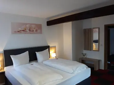 Ein Bett oder Betten in einem Zimmer der Unterkunft Hotel Luca