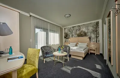 Ein Bett oder Betten in einem Zimmer der Unterkunft Landhotel Sternwirt - Das Wellnesshotel zwischen Nürnberg und Amberg