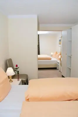 Ein Bett oder Betten in einem Zimmer der Unterkunft Hotel Albergo Mamma Rosa