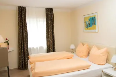 Ein Bett oder Betten in einem Zimmer der Unterkunft Hotel Albergo Mamma Rosa
