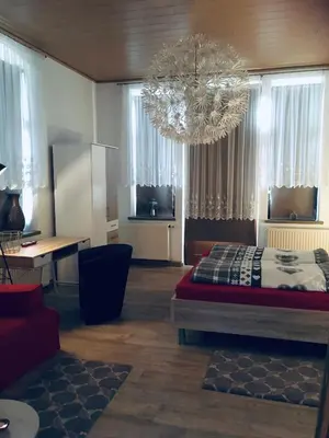Ein Bett oder Betten in einem Zimmer der Unterkunft Turmvilla Vogtland