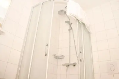 Ein Badezimmer in der Unterkunft Hotel Gasthof zur Post