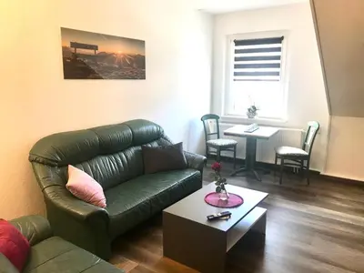 Ein Sitzbereich in der Unterkunft Apartment Enno