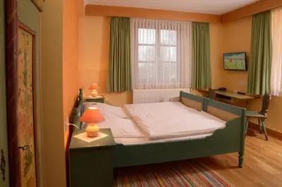 Ein Bett oder Betten in einem Zimmer der Unterkunft Landgasthof Haueis
