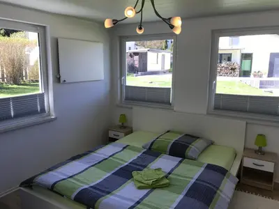 Ein Bett oder Betten in einem Zimmer der Unterkunft Ferienbungalow Grünbach