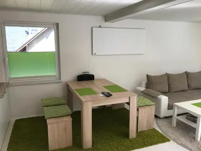 Ein Sitzbereich in der Unterkunft Ferienbungalow Grünbach