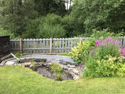 Ein Garten an der Unterkunft Ferienbungalow Grünbach