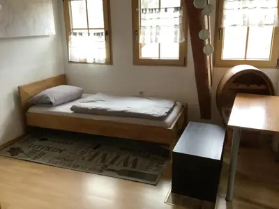 Ein Bett oder Betten in einem Zimmer der Unterkunft Ferienwohnung Eva und Alexander