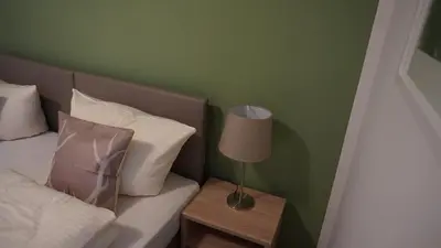 Ein Bett oder Betten in einem Zimmer der Unterkunft Pension Turm