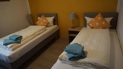 Ein Bett oder Betten in einem Zimmer der Unterkunft Pension Turm