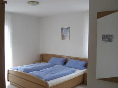 Ein Bett oder Betten in einem Zimmer der Unterkunft Pension Beer