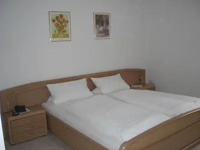 Ein Bett oder Betten in einem Zimmer der Unterkunft Pension Beer
