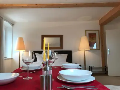 Ein Sitzbereich in der Unterkunft Apartments Fichtelberger Blick