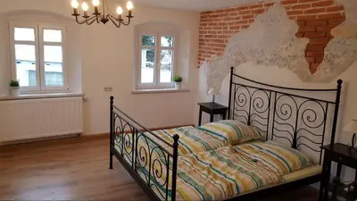 Ein Bett oder Betten in einem Zimmer der Unterkunft Ferienwohnung Trogschneider Hof