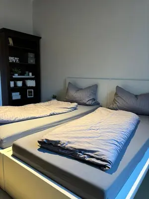 Ein Bett oder Betten in einem Zimmer der Unterkunft Ruhige Fewo,42qm,2SchlaZi, 4Pers, Vollausstattung